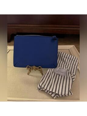 Anya Hindmarch leather royal blue clutch pouch with tassel zip close